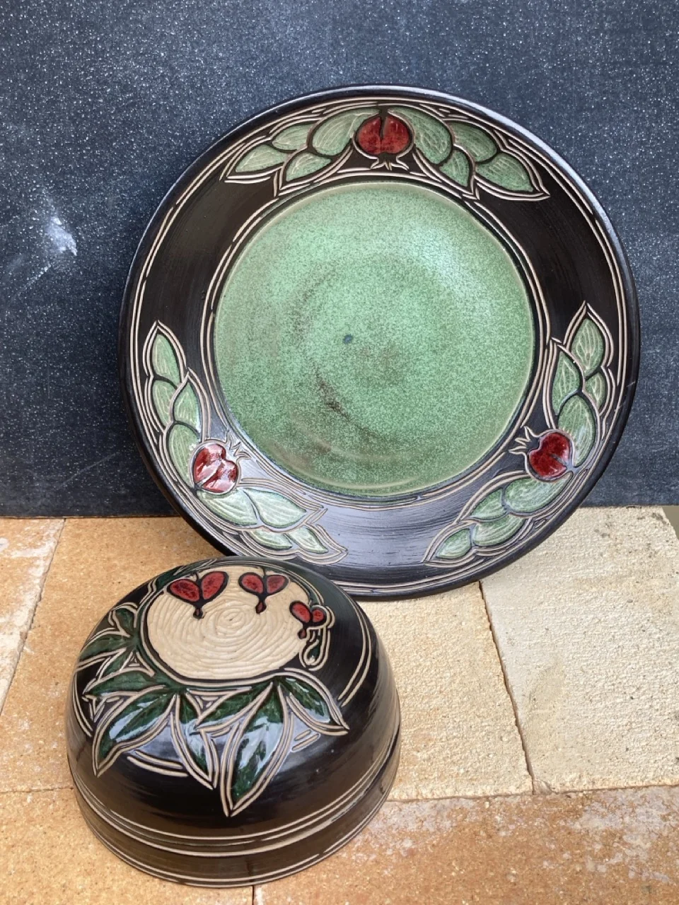 Bowl and plate with pomegrante decorations