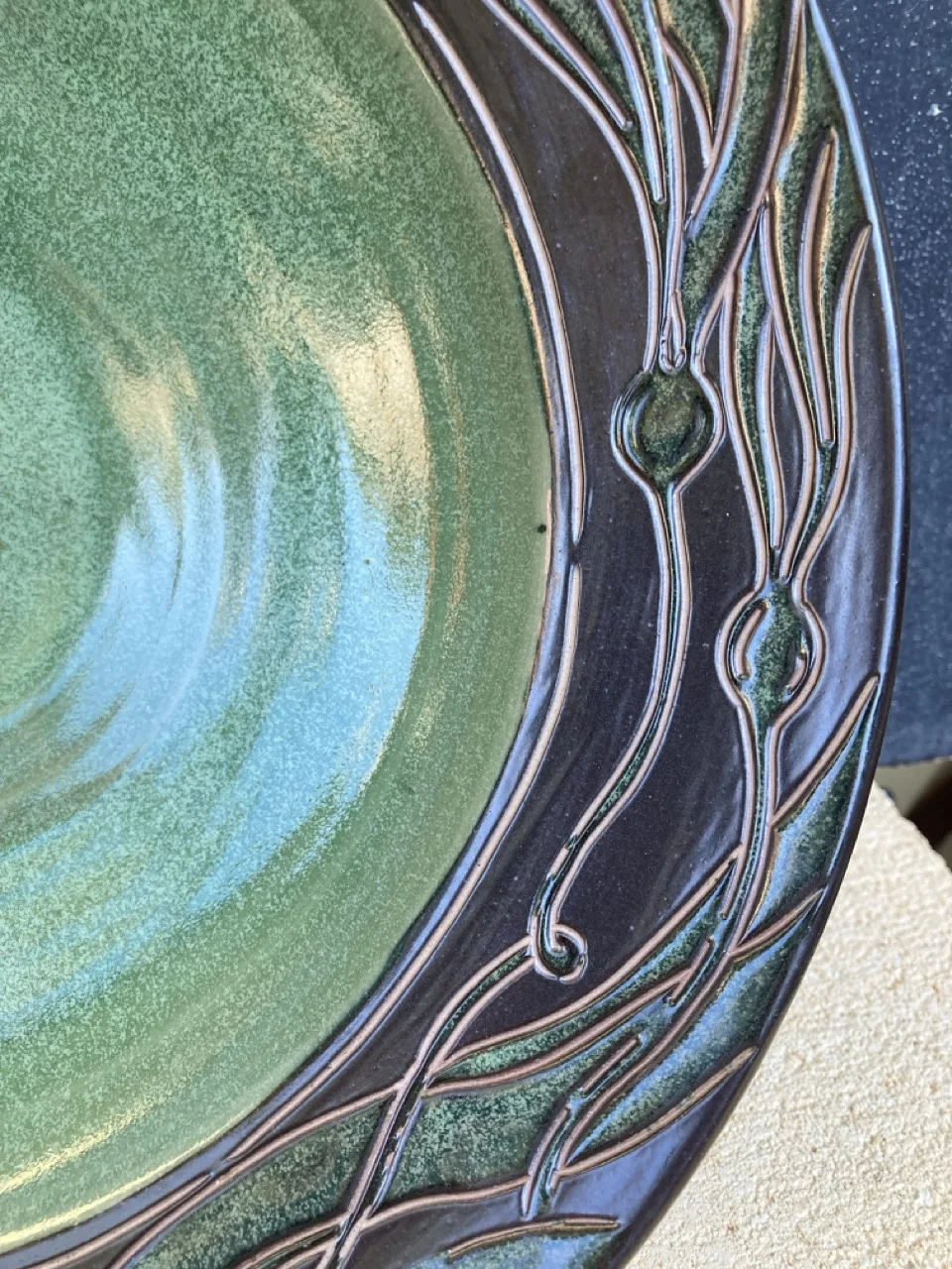 Detail of a plate with seaweed edge