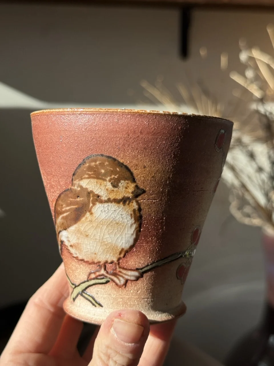 Small brown cup with sparrow painting